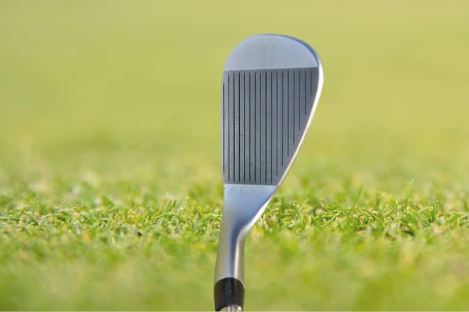 Grooves on clubface of PING glide 4.0 wedge
