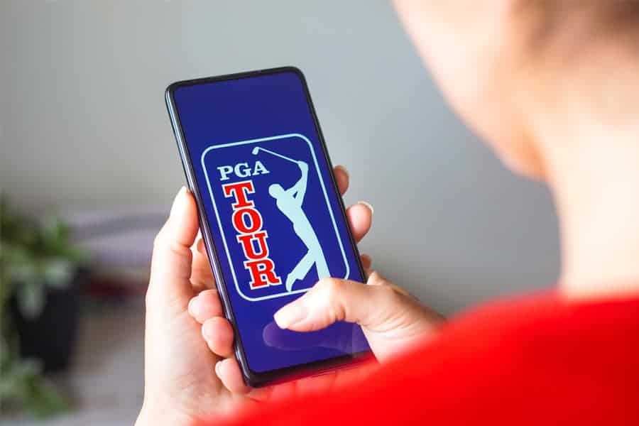 a female viewing PGA Tour on the display of her phone